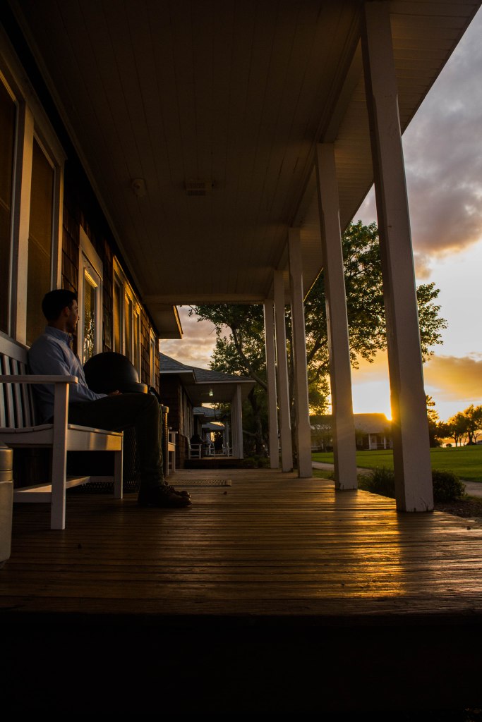 Ryan Huang: Everyone always loves a good sunset, and while walking hanging out with friends at the Duke University Marine Lab, I could not pass up the opportunity to take a shot. Here, my friend Chase is sitting on one of the plethora of porches chilling after a long day of conference talks, enjoying the sunset as the day winds down.